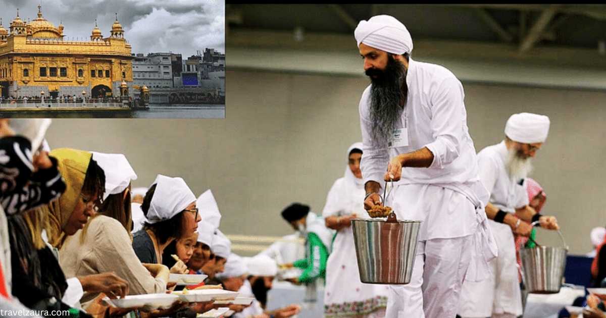 Visitors sharing a free meal at Golden Temple's langar hall, Amritsar.