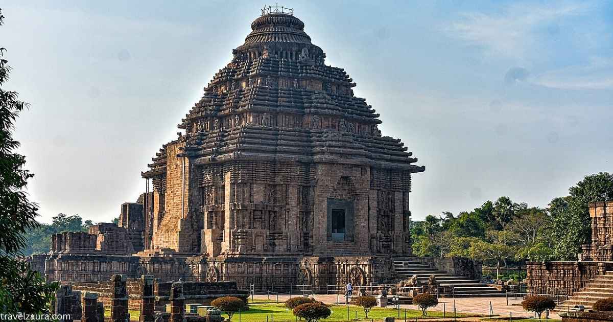 Konark Sun Temple stone chariot wheels at sunrise, Odisha.