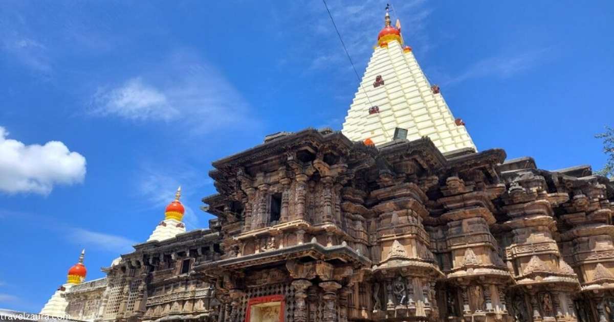 Mahalaxmi Temple Kolhapur ancient stone shikhara exterior view.