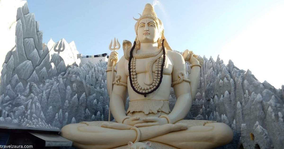 65-foot Shiva statue at Shivoham Shiva Temple Bangalore during evening darshan.