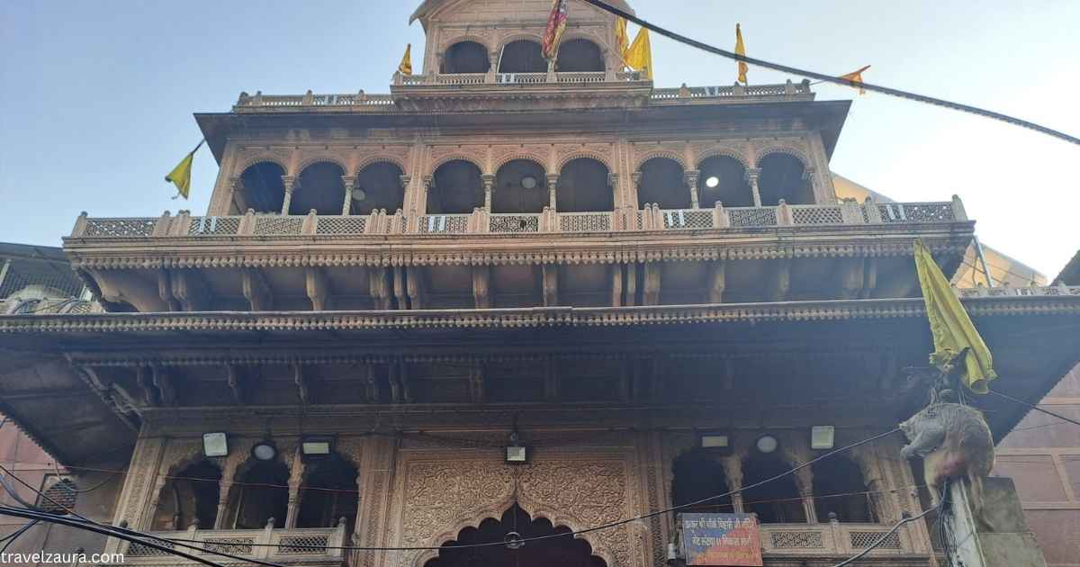 Devotees at Banke Bihari Temple entrance during morning darshan in Vrindavan.