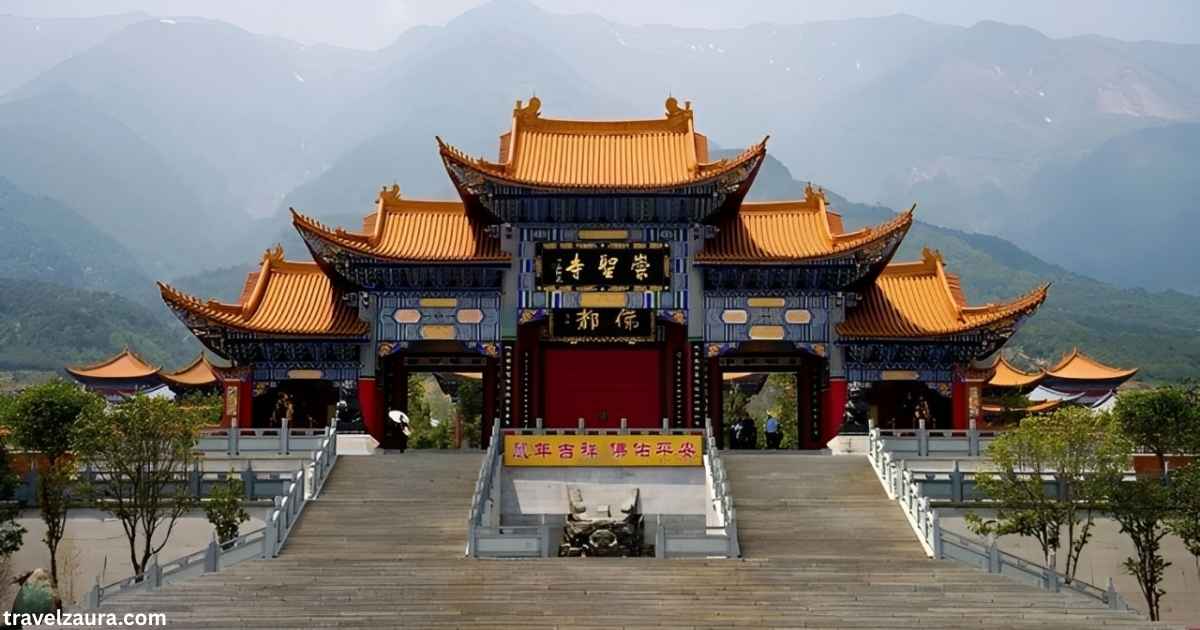 Red and gold Chinese temple with dragon-carved curved roof.