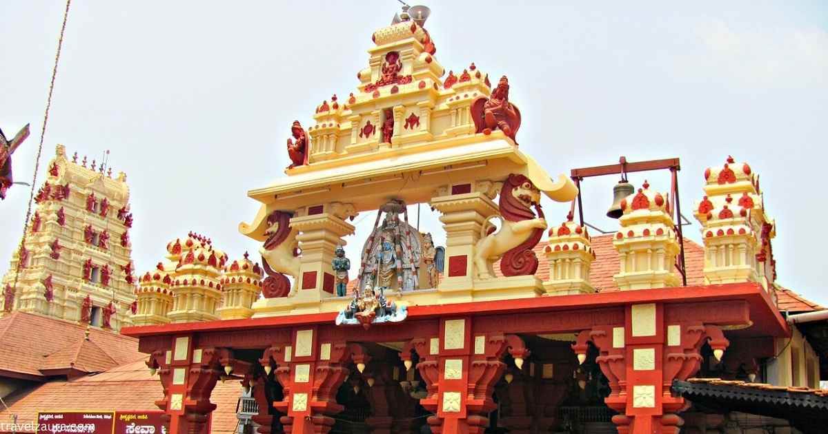 Devotees at Udupi Sri Krishna Temple entrance during morning darshan.
