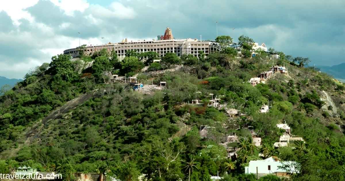 Palani Murugan Temple hilltop shrine with pilgrims on the 693 steps.