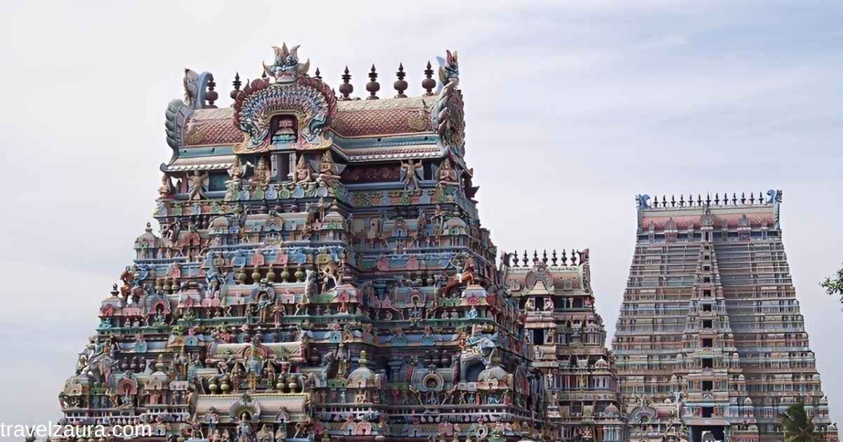 Srirangam Ranganathaswamy Temple gopuram at sunrise during morning darshan.