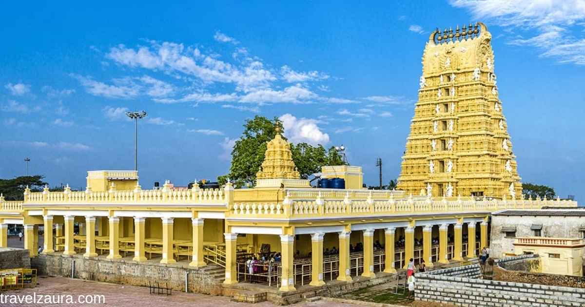 Chamundeshwari Temple Mysore gopuram at sunset on Chamundi Hills.