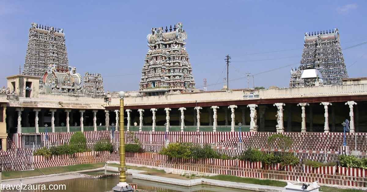 Madurai Meenakshi Temple gopuram with colorful carvings.