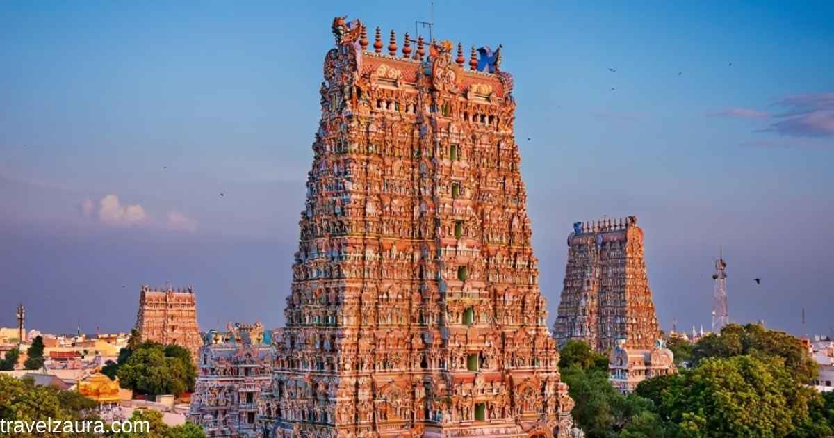 Meenakshi Amman Temple gopurams at sunset in Madurai.