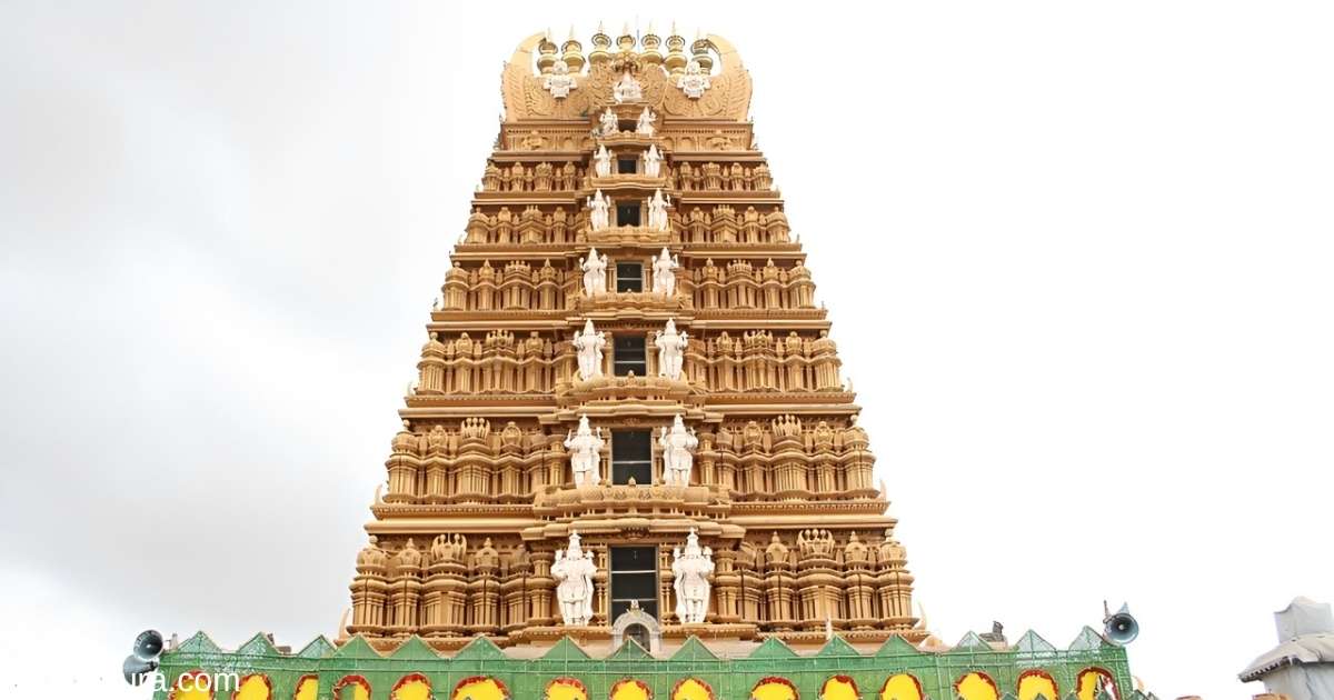 Nanjangud Temple timings displayed at the entrance during morning darshan.